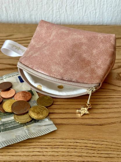 Vue de l'intérieur du petit porte-monnaie or rose.