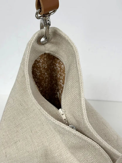 Le sac Hobo en lin ivoire avec fermeture éclair