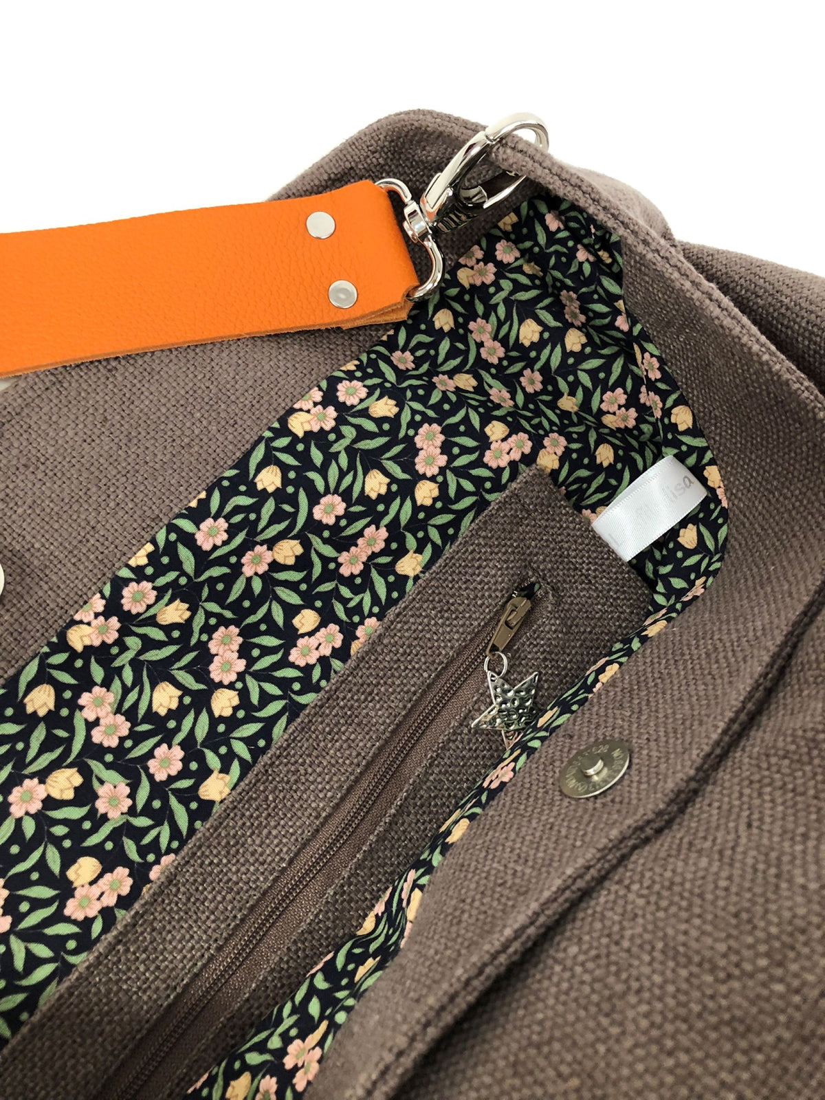 Hobo bag in earth brown linen, orange leather handle