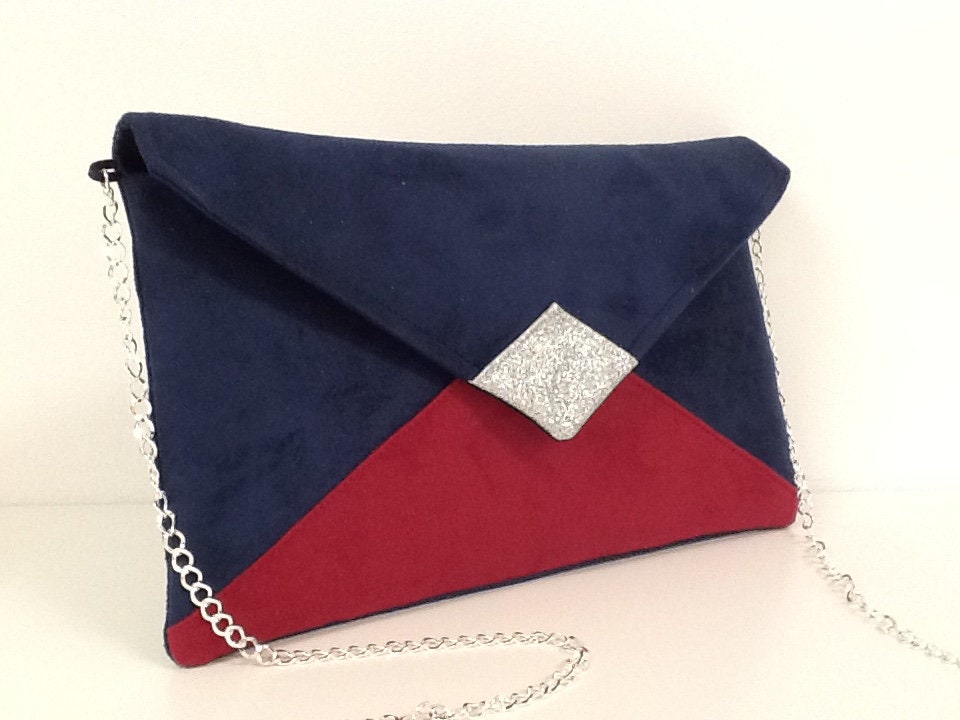 Isa clutch bag in navy blue and fuchsia with silver sequins