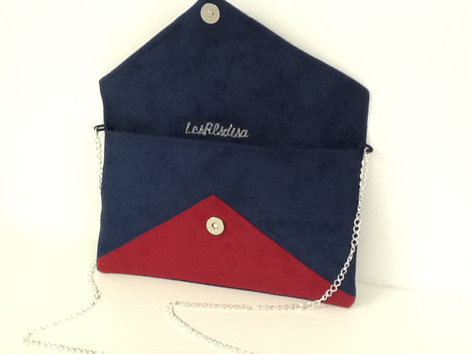 Isa clutch bag in navy blue and fuchsia with silver sequins
