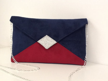 Isa clutch bag in navy blue and fuchsia with silver sequins