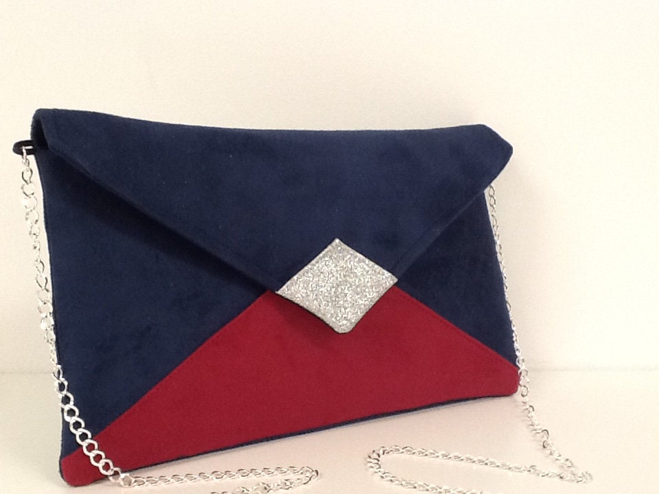 Isa clutch bag in navy blue and fuchsia with silver sequins
