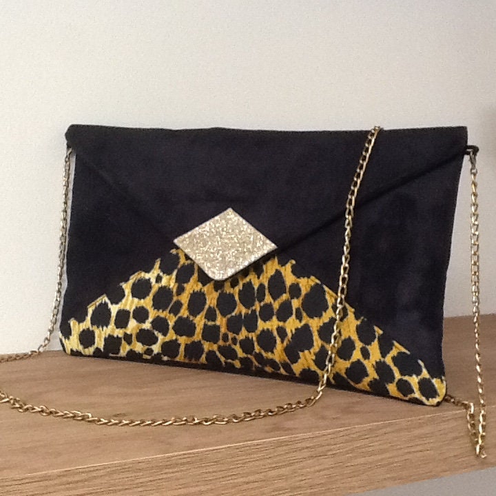 Isa clutch bag black and leopard with gold sequins
