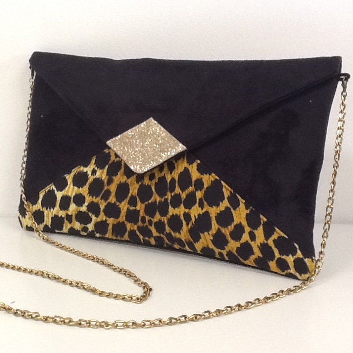 Isa clutch bag black and leopard with gold sequins