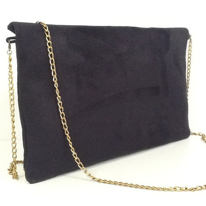 Isa clutch bag black and leopard with gold sequins