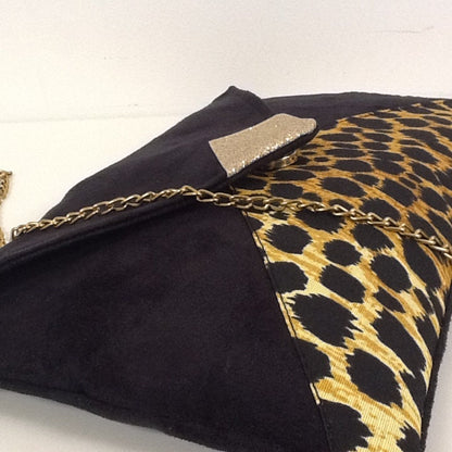 Isa clutch bag black and leopard with gold sequins
