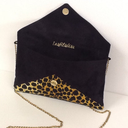 Isa clutch bag black and leopard with gold sequins