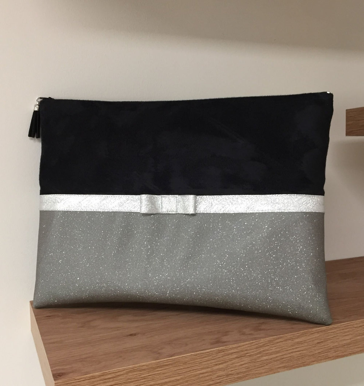 Black and gray laptop bag with silver bow